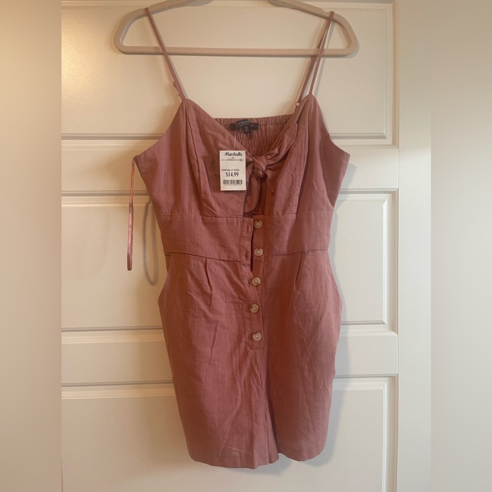 Women’s medium pink button up romper